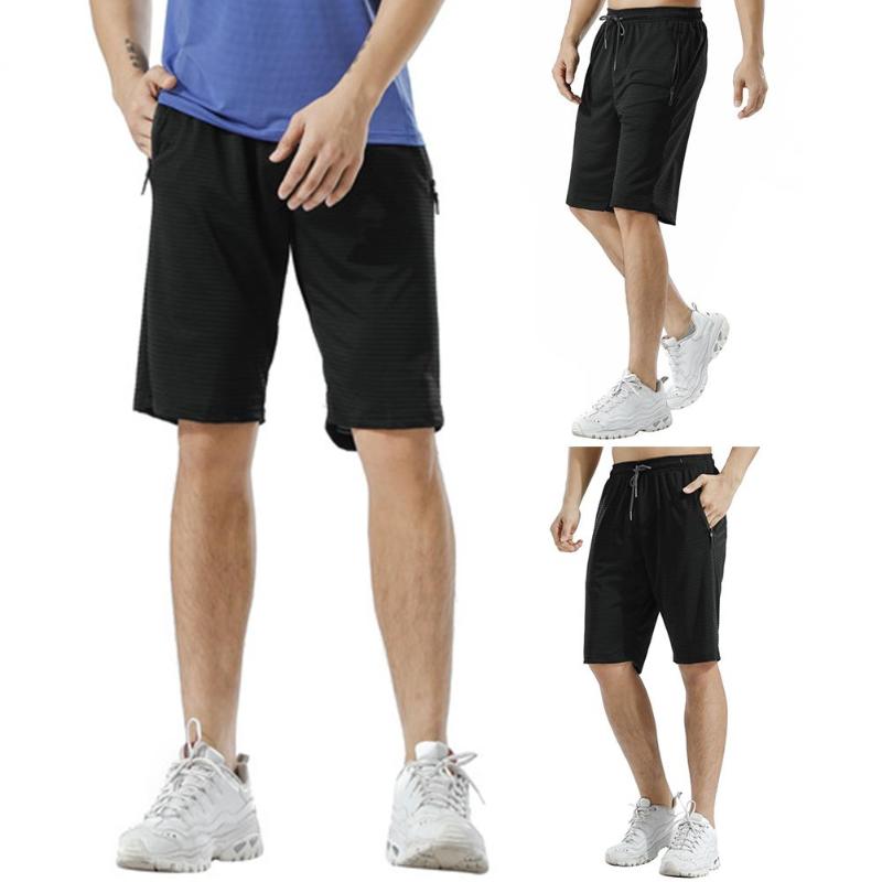 Men Breathable Quick Drying Drawstring Pockets Training Sports Running Shorts, Black
Men Breathable Quick Drying Drawstring Pockets Training Sports Running Shorts, Black