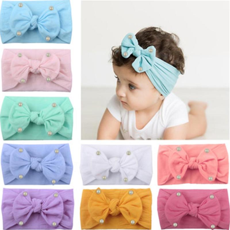 20 Color Solid Peral Baby Headbands For Girls Handmade Bow Soft Elastic Baby Turban Headband Adjustable Hair Accessories Newborn
20 Color Solid Peral Baby Headbands For Girls Handmade Bow Soft Elastic Baby Turban Headband Adjustable Hair Accessories Newborn