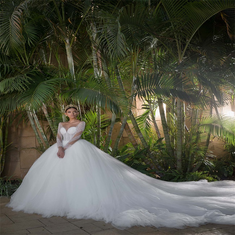 Elegant A-line Wedding Dresses Luxury Beaded Jewel Neck Sheer Long Sleeve Church Bridal Gowns Custom Made Court Train Vestidos De Novia