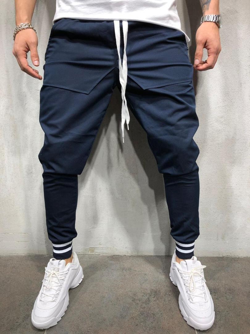 Men's slacks with elastic waistlines are designed as multi-pocket slacks for casual joggers, Light gray
Men's slacks with elastic waistlines are designed as multi-pocket slacks for casual joggers, Light gray