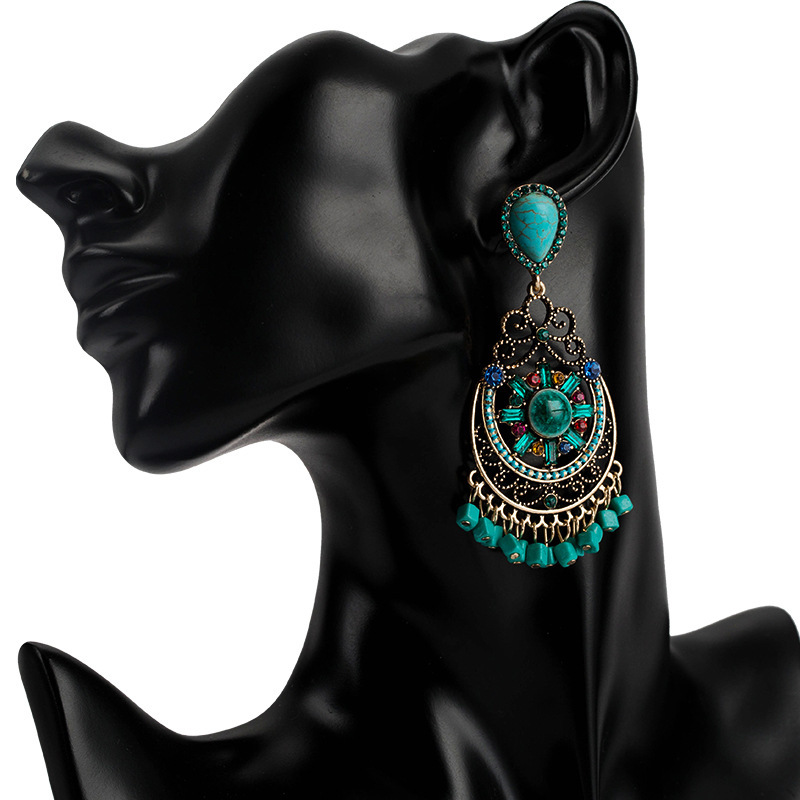 Exaggerated alloy acrylic rice beads woven earrings women Bohemian national style ear accessories
Exaggerated alloy acrylic rice beads woven earrings women Bohemian national style ear accessories