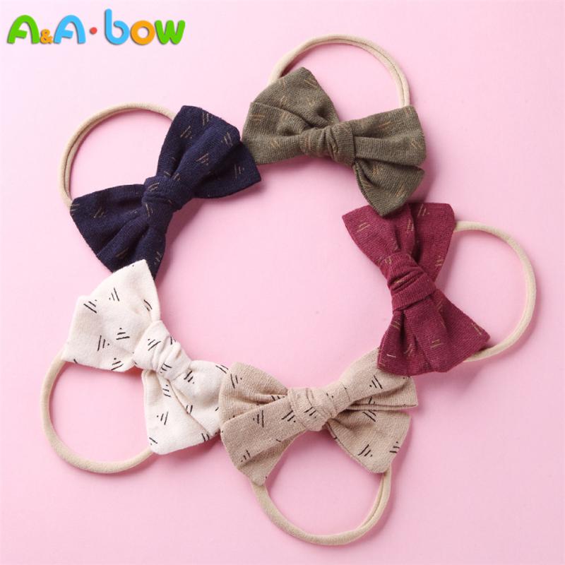 5pcs/lot New Style Fabric bow headbands Headwear Print Elastic Nylon Hair Band Soft Cue Princess Bow Baby Girls Hair Accessories 
5pcs/lot New Style Fabric bow headbands Headwear Print Elastic Nylon Hair Band Soft Cue Princess Bow Baby Girls Hair Accessories
