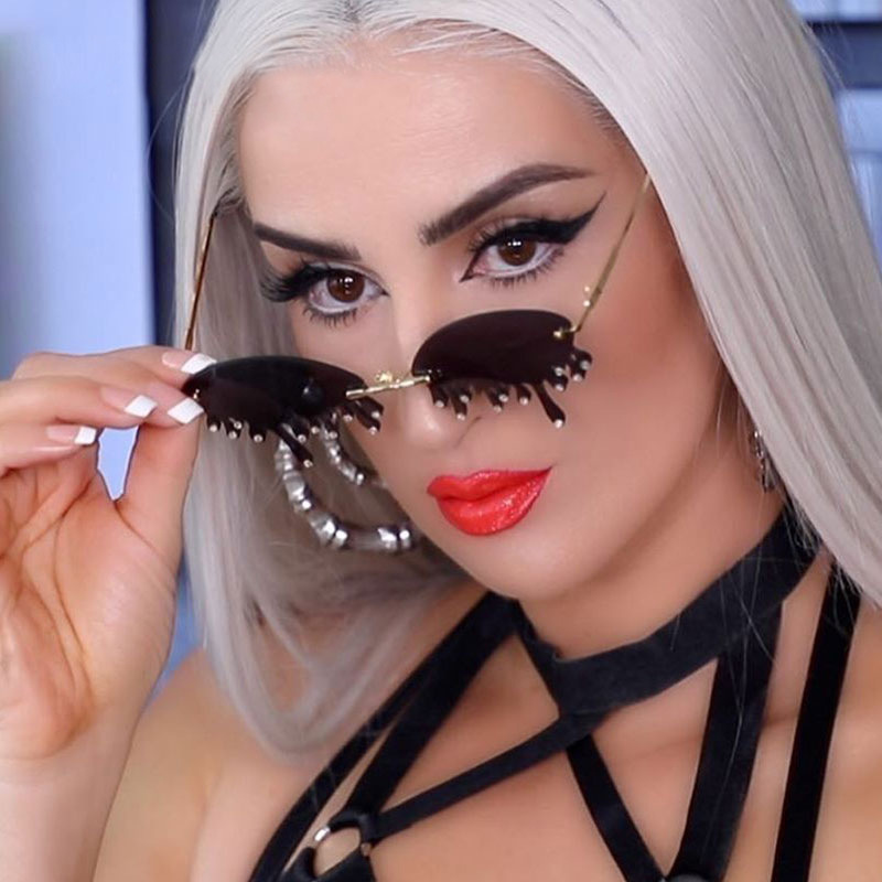 Frameless Sunglasses Point drill tear Sunglasses female tear drop design Sunglasses Women Retro Candy Color Eyewears 
Frameless Sunglasses Point drill tear Sunglasses female tear drop design Sunglasses Women Retro Candy Color Eyewears