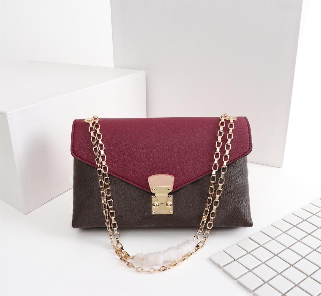 Classic L letter print stitching leather womens handbag fashion golden chain bag classic style never outdated, Red
Classic L letter print stitching leather womens handbag fashion golden chain bag classic style never outdated, Red