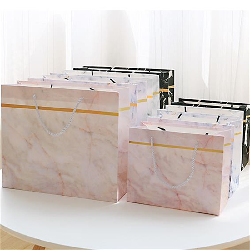 12pcs/lot White Marble Shopping Paper Bag Clothes Jewelry Gift Bag Packaging Shopping Marble Wedding Birthday Packing Supplies
12pcs/lot White Marble Shopping Paper Bag Clothes Jewelry Gift Bag Packaging Shopping Marble Wedding Birthday Packing Supplies
