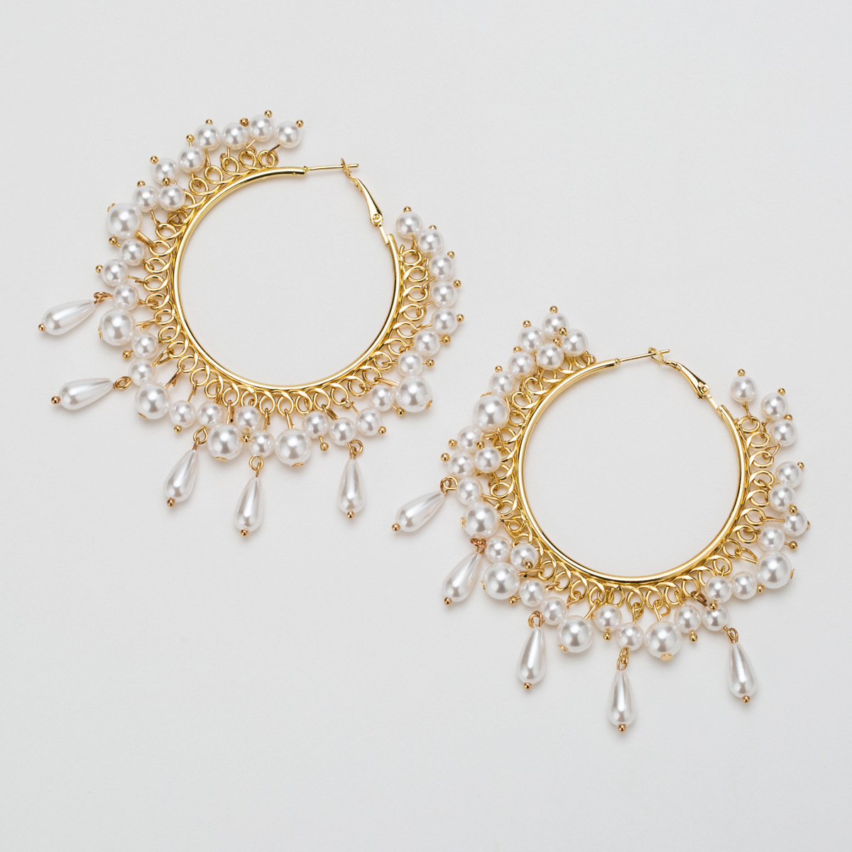 Ring alloy imitation pearl earrings women's high-end fashion Net red ins Wind earrings
Ring alloy imitation pearl earrings women's high-end fashion Net red ins Wind earrings