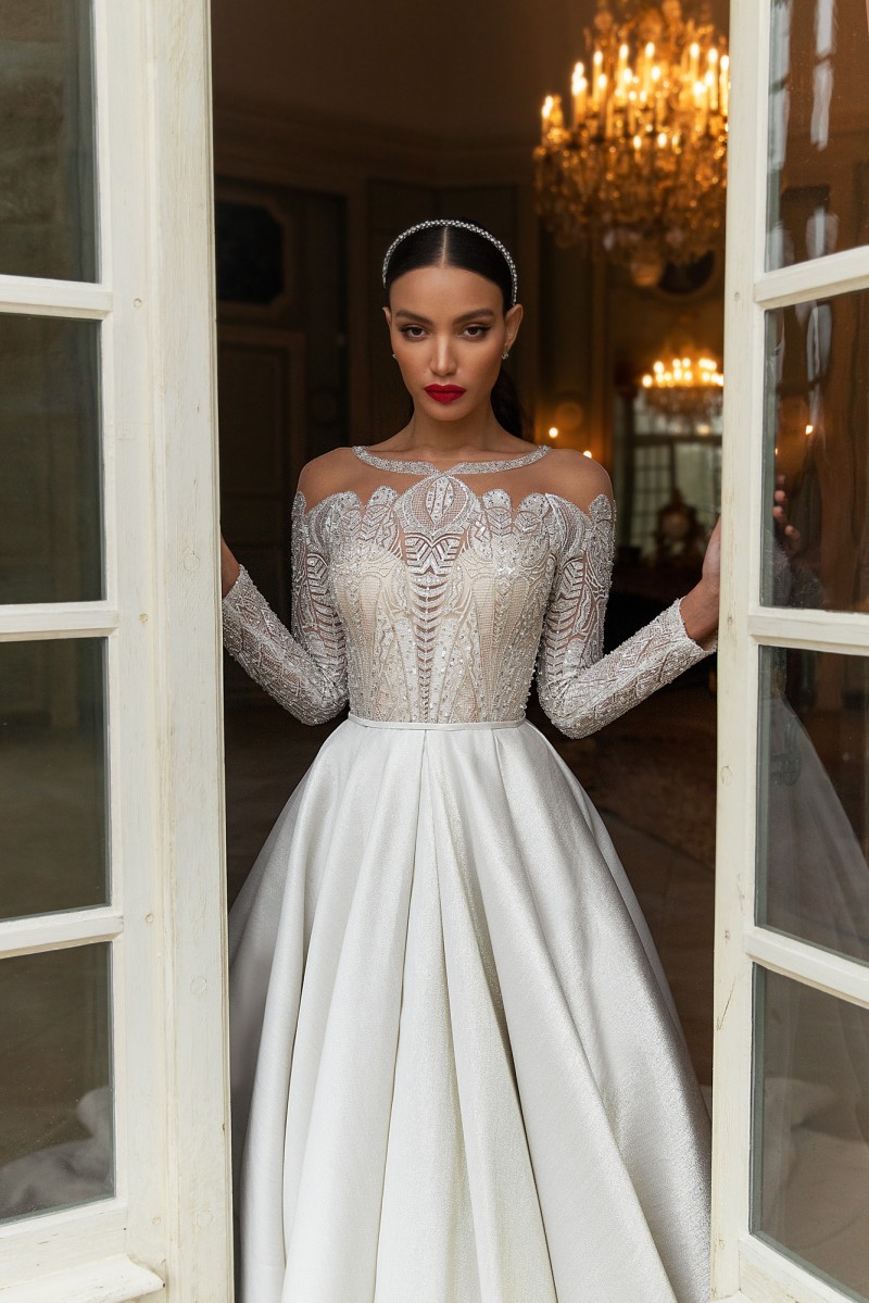 Elegant Sequined Lace Wedding Dresses Sheer Bateau Neck A Line Beaded Long Sleeves Bridal Gowns Sweep Train Satin robe de mariée
