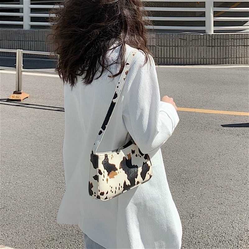 Vintage PU Leather Milk Cow Print Women Baguette Handbag Fashion Design Ladies Shoulder Crossbody Bags Retro Female Clutch Purse
Vintage PU Leather Milk Cow Print Women Baguette Handbag Fashion Design Ladies Shoulder Crossbody Bags Retro Female Clutch Purse