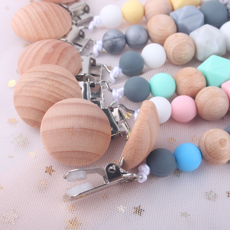 Fashion Silicone Baby Pacifier Clip Wood Beaded Holder Clips Anti Dropping Chain Appease Maternal And Infant Products 5bq D2
Fashion Silicone Baby Pacifier Clip Wood Beaded Holder Clips Anti Dropping Chain Appease Maternal And Infant Products 5bq D2