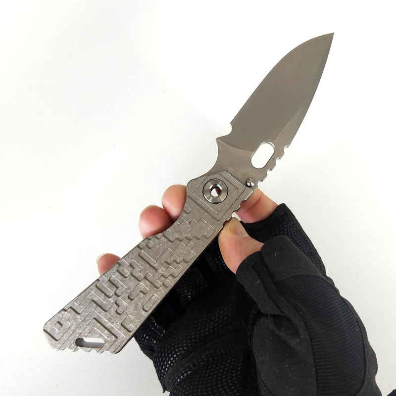 EVIL EYES Customized Sng Folding Knife High End Crystalline Titanium Knives 100% M390 Blade Outdoor Knifes Tactical Camping Hunting Tools Pe
EVIL EYES Customized Sng Folding Knife High End Crystalline Titanium Knives 100% M390 Blade Outdoor Knifes Tactical Camping Hunting Tools Pe