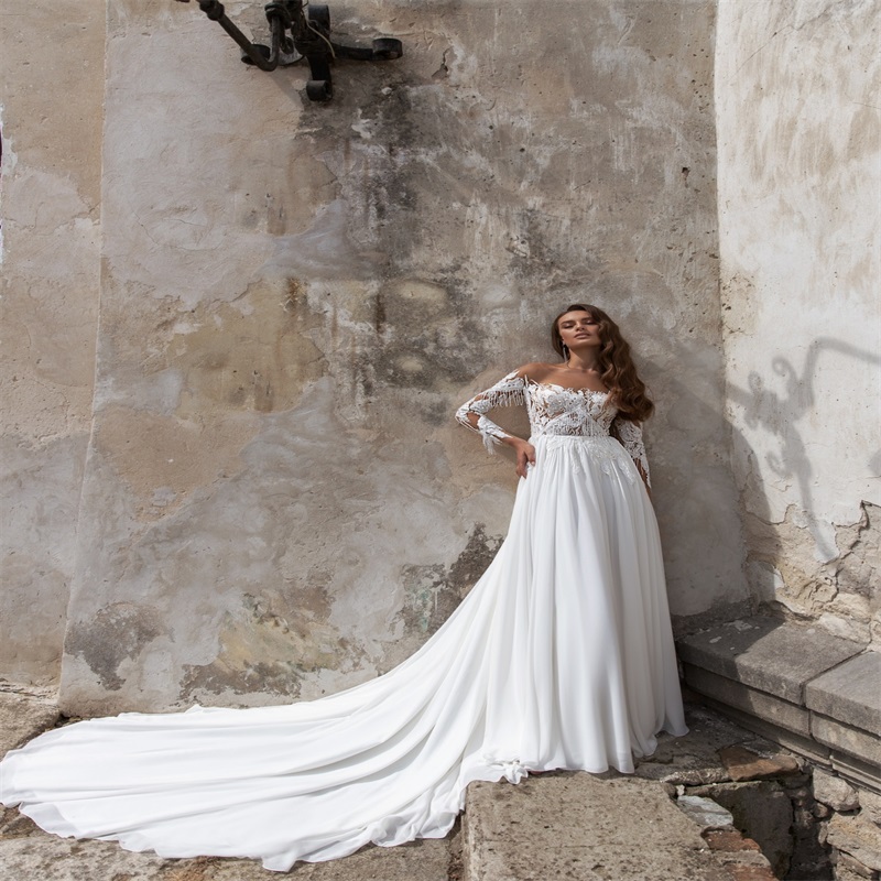 elegant long sleeves aline wedding dresses custom made lace tassel appliqued bridal gown hot sale bateau court train boho bridal gown