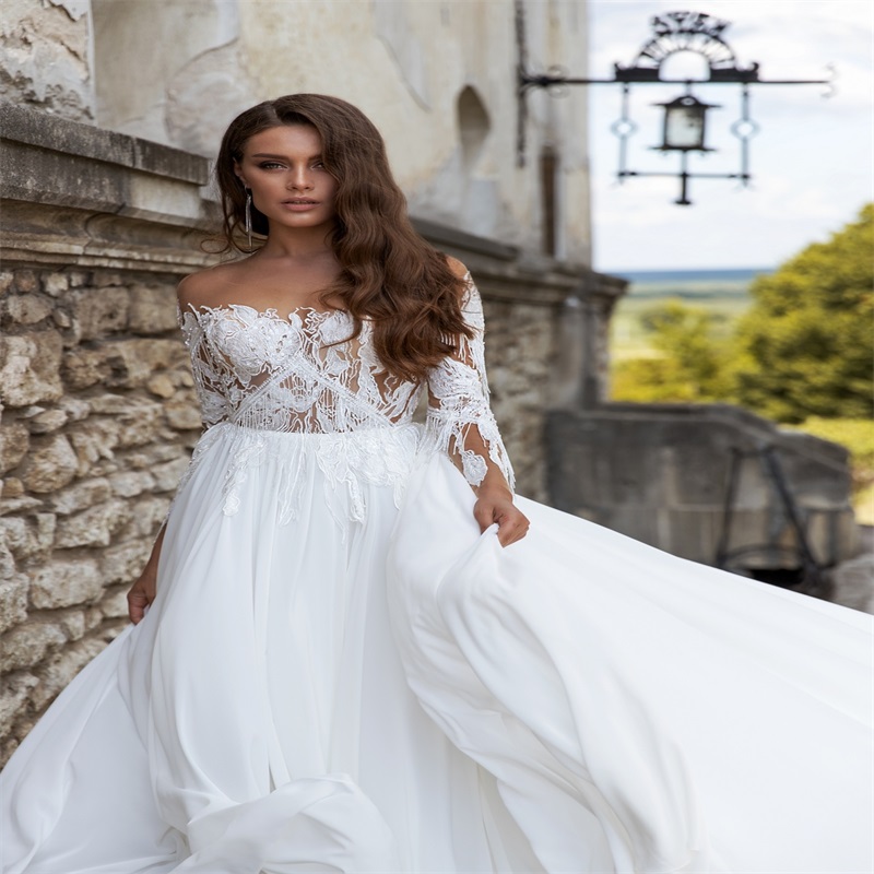 elegant long sleeves aline wedding dresses custom made lace tassel appliqued bridal gown hot sale bateau court train boho bridal gown
