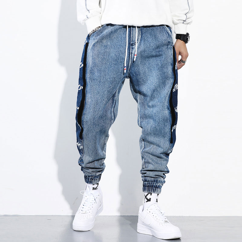 Fashion Streetwear Men Jeans Loose Fit Blue Color Cargo Pants Side Stripe Printed Designer Harem Jeans Hip Hop Men Joggers
Fashion Streetwear Men Jeans Loose Fit Blue Color Cargo Pants Side Stripe Printed Designer Harem Jeans Hip Hop Men Joggers