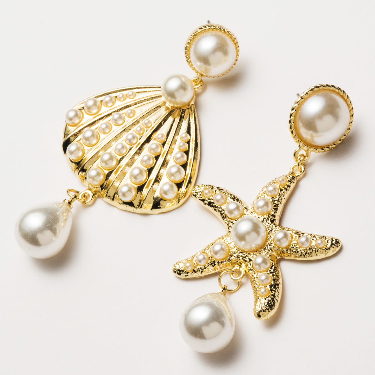 earrings alloy starfish shell with Pearl asymmetric earrings women's high-end personalized ear accessories
earrings alloy starfish shell with Pearl asymmetric earrings women's high-end personalized ear accessories