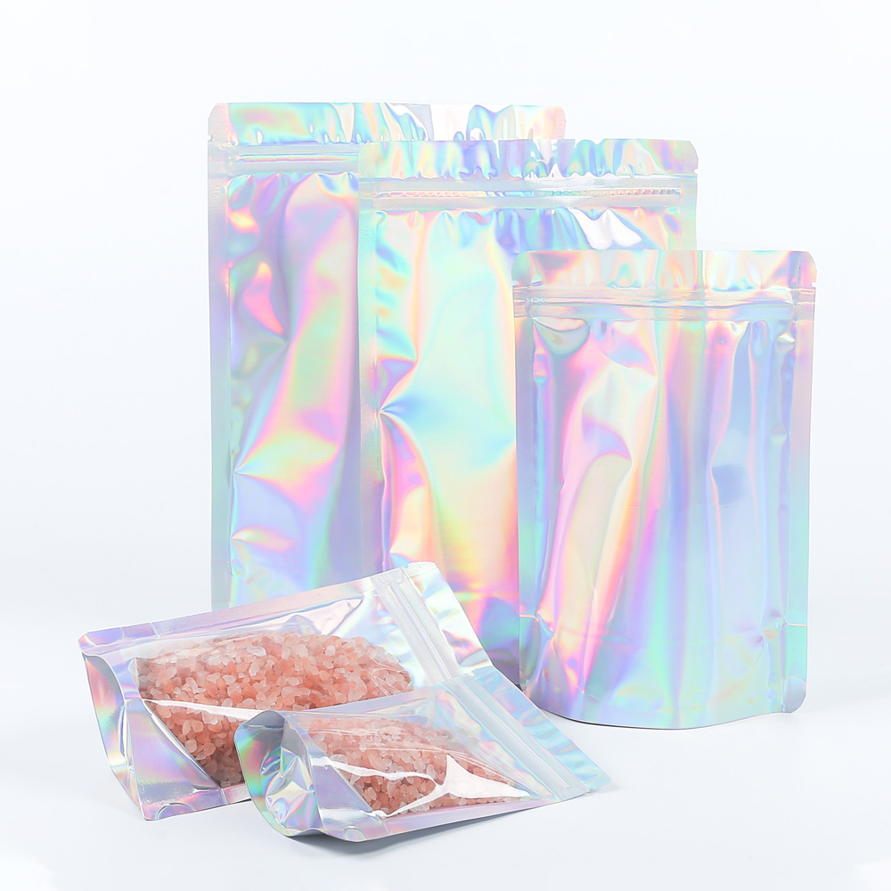 High Quality Assorted Size Foil Glossy Clear Front Holographic Silver Back Stand Up Zip Lock Round Corner Bag With Tear Notch
High Quality Assorted Size Foil Glossy Clear Front Holographic Silver Back Stand Up Zip Lock Round Corner Bag With Tear Notch