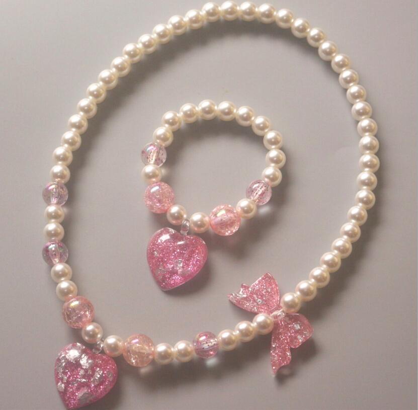 Girl kids Jewelry New children's Pearl Necklace Bracelet two piece set of love Star butterfly princess Jewelry Christmas gift, Love heart mix colors
Girl kids Jewelry New children's Pearl Necklace Bracelet two piece set of love Star butterfly princess Jewelry Christmas gift, Love heart mix colors