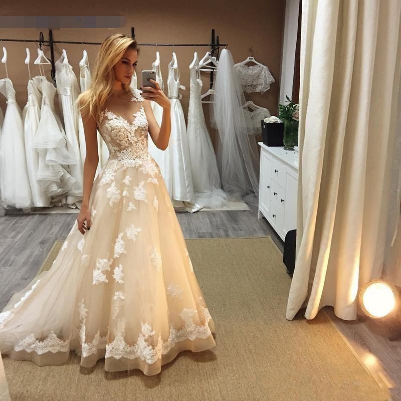 Cap Sleeves Lace Wedding Dresses 2020 with Appliques Sweep Train Jewel Neck Tulle A Line Plus Size Wedding Bridal Gowns
