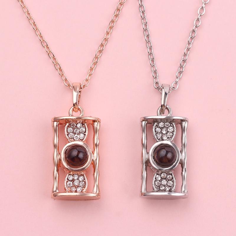 Lovers necklace hundred languages "I love you" necklace creative hourglass pendant love memory projection pendant gift
Lovers necklace hundred languages "I love you" necklace creative hourglass pendant love memory projection pendant gift