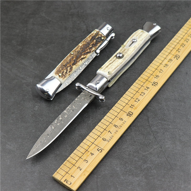 New outdoor camp Mafia Damascus steel staghorn handle automatic folding blade edge EDC tactical hunting folding knife pocket knife
New outdoor camp Mafia Damascus steel staghorn handle automatic folding blade edge EDC tactical hunting folding knife pocket knife