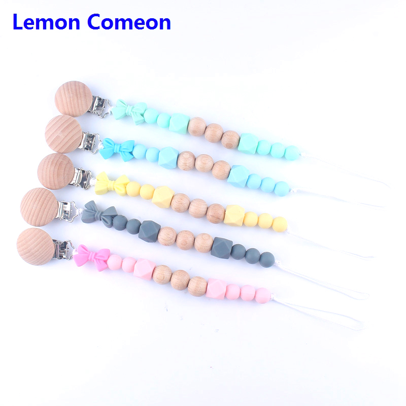 Lemon Comeon Pink Silicone Pacifier Clips Handmade Safe Teething Chain Bow Beads Baby Teether Holder Chain Baby Care Products
Lemon Comeon Pink Silicone Pacifier Clips Handmade Safe Teething Chain Bow Beads Baby Teether Holder Chain Baby Care Products