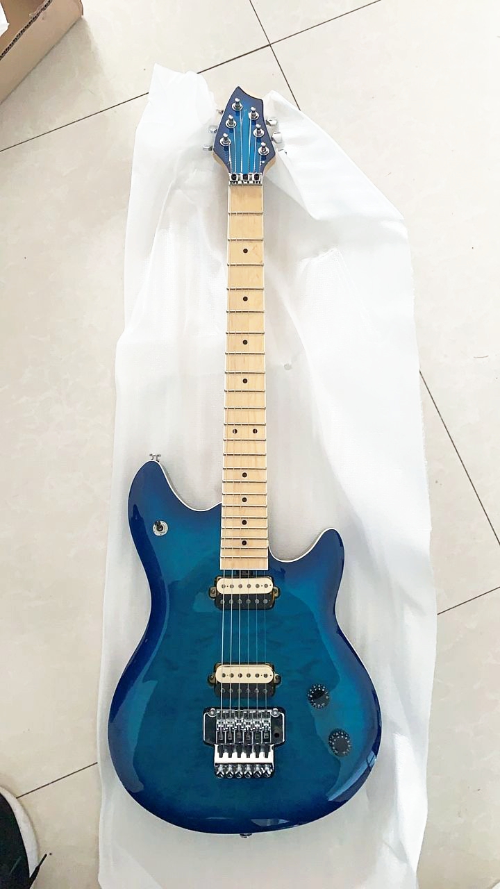 Custom Made Blue Quiltd Maple Top Electric Guitar Chrome Hardware Tremolo Bridge China Guitars Free Shipping
Custom Made Blue Quiltd Maple Top Electric Guitar Chrome Hardware Tremolo Bridge China Guitars Free Shipping