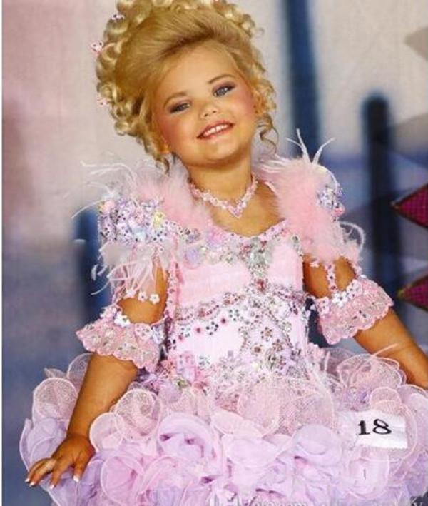 Lovely Eden Wood Pink Baby Toddler Pageant Dresses For Girls Glitz Rhinestones Ball Gown Pink Feathered Kids Party Dresses
