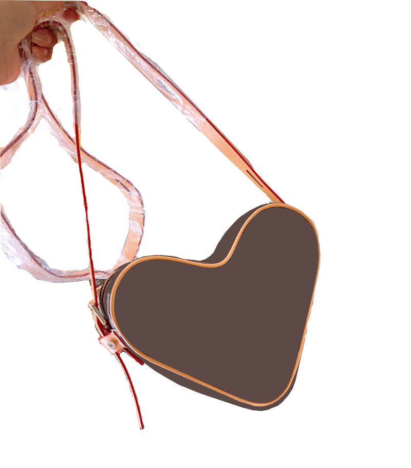 Top quality designer famous Orignal leather hearts bag fashion handbags presbyopic women's floral bag purse with gift box free shipping
Top quality designer famous Orignal leather hearts bag fashion handbags presbyopic women's floral bag purse with gift box free shipping