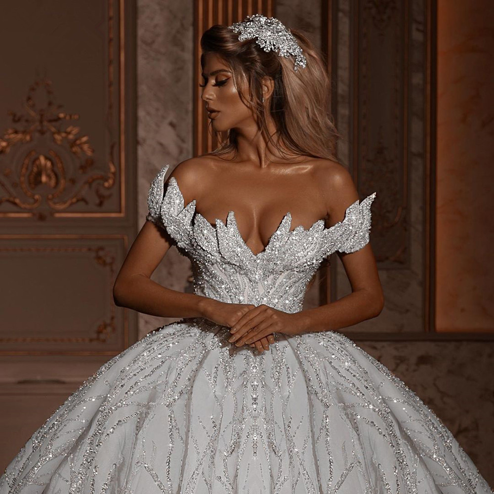 2021 Vintage Ball Gown Wedding Dresses Plus Size Crystal Beaded Bridal Gowns with Sequins Off Shoulder Arabic Luxury Robes De Mariée