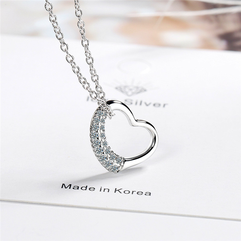 Cute Female White Crystal Pendant Necklace Charm Silver Color Chain Necklaces For Women Trendy Hollow Heart Wedding Necklace
Cute Female White Crystal Pendant Necklace Charm Silver Color Chain Necklaces For Women Trendy Hollow Heart Wedding Necklace