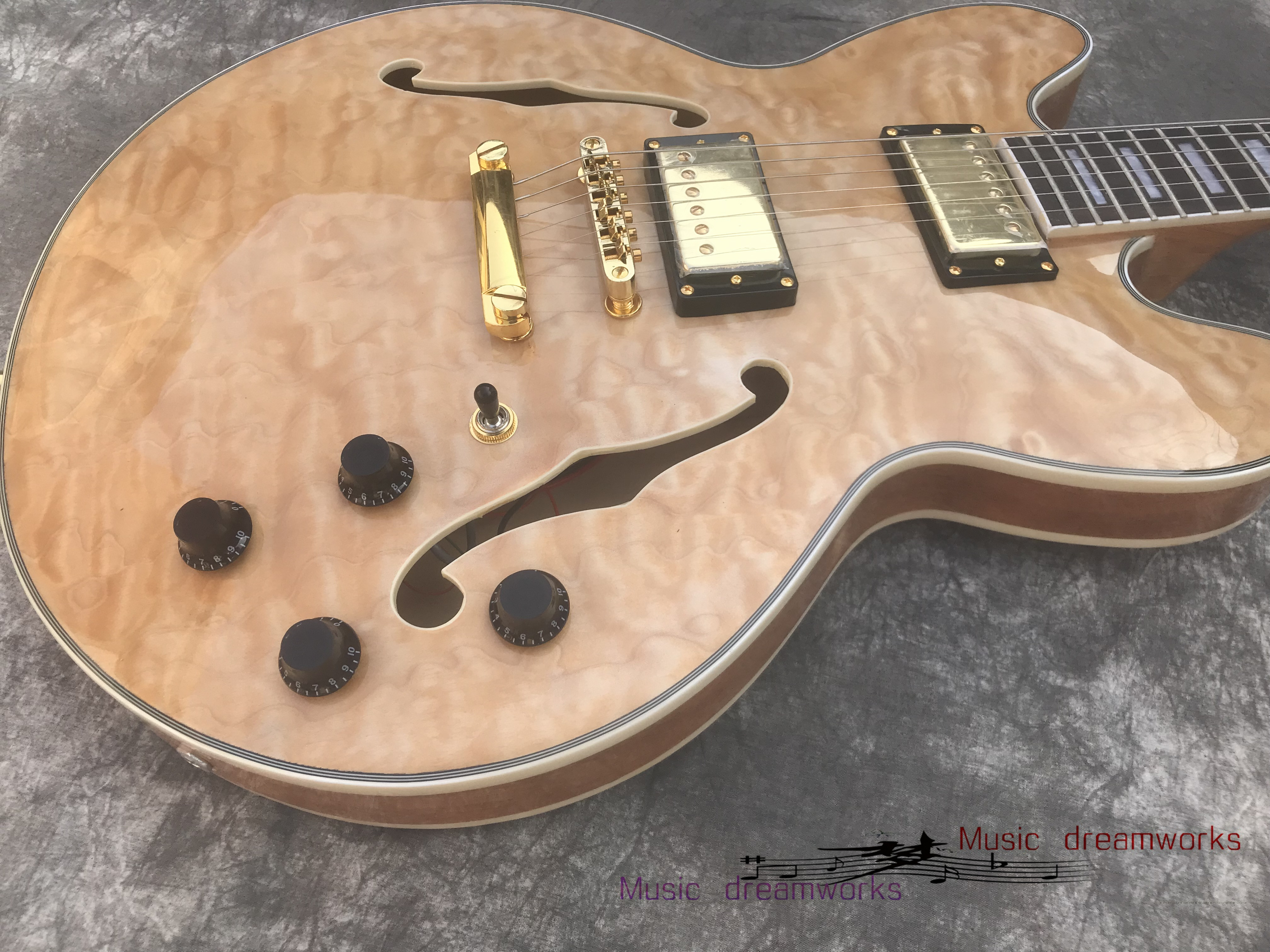 China electric guitar OEM shop 335 guitar hollow jazz guitar quilted maple wood original wood color ,Free shipping
China electric guitar OEM shop 335 guitar hollow jazz guitar quilted maple wood original wood color ,Free shipping
