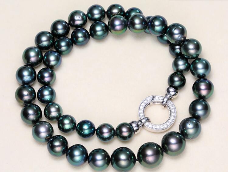 stunning 10-11mm south sea round peacock green pearl necklace 18inch
stunning 10-11mm south sea round peacock green pearl necklace 18inch