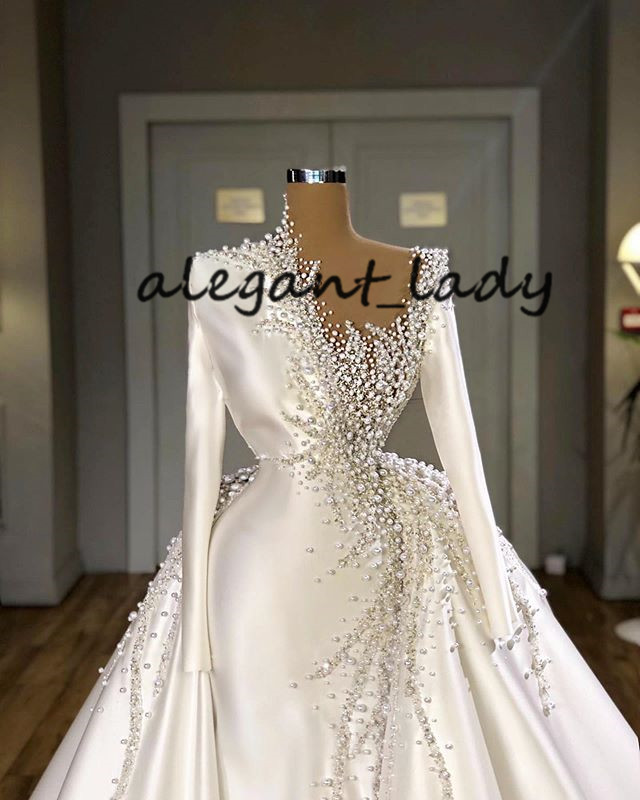 Plus Size Arabic Wedding Dresses 2021 Long Sleeve Luxury Pearls Beaded Puffy Overskirt Princess Church Garden Wedding Gowns valdrinsahiti