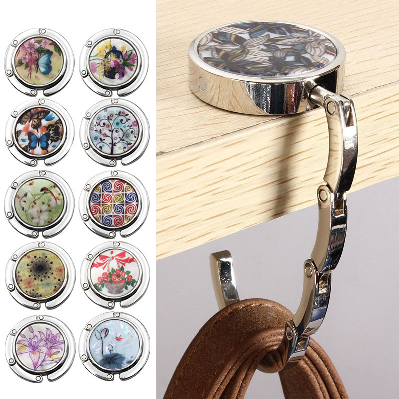 Exquisite Metal Handbag Foldable Hanger Holder Hook Portable Round Shell Purse Bag Hangers Magic Table Hooks Hanging 18 Colors
Exquisite Metal Handbag Foldable Hanger Holder Hook Portable Round Shell Purse Bag Hangers Magic Table Hooks Hanging 18 Colors