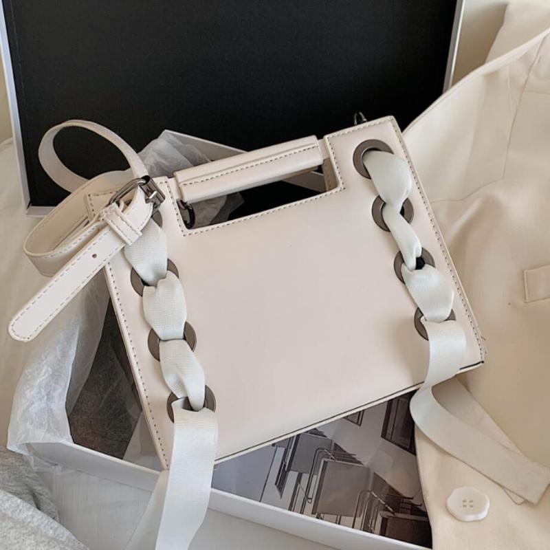 Solid color Square Tote bag 2021 Fashion New High-quality Leather Women's Designer Handbag Travel Ribbon Shoulder Messenger Bag, Black
Solid color Square Tote bag 2021 Fashion New High-quality Leather Women's Designer Handbag Travel Ribbon Shoulder Messenger Bag, Black