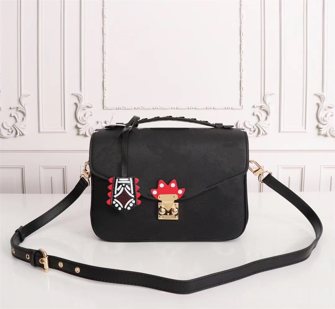 CRAFTY POCHETTE MÉTIS Embossed Leather Extra-large Print Letters Braided Top Handle Graffiti Inspired Charm Shoulder Crossbody Bag, White with dust bag
CRAFTY POCHETTE MÉTIS Embossed Leather Extra-large Print Letters Braided Top Handle Graffiti Inspired Charm Shoulder Crossbody Bag, White with dust bag