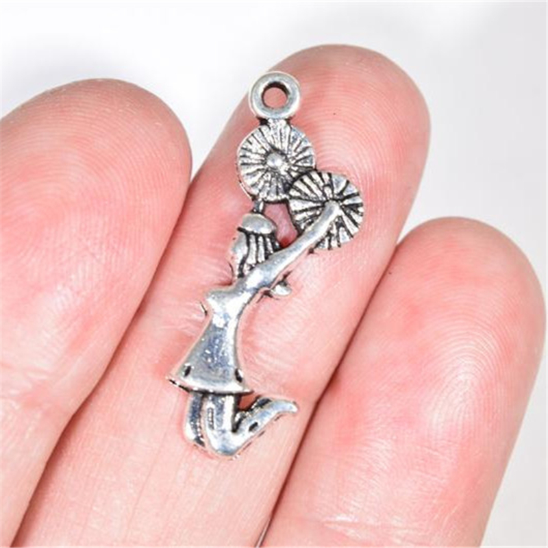 20X Cheerleader Charms Pom Pom Charms Cheerleading Team Football Cheerleader Team Sports 28x11mm
20X Cheerleader Charms Pom Pom Charms Cheerleading Team Football Cheerleader Team Sports 28x11mm