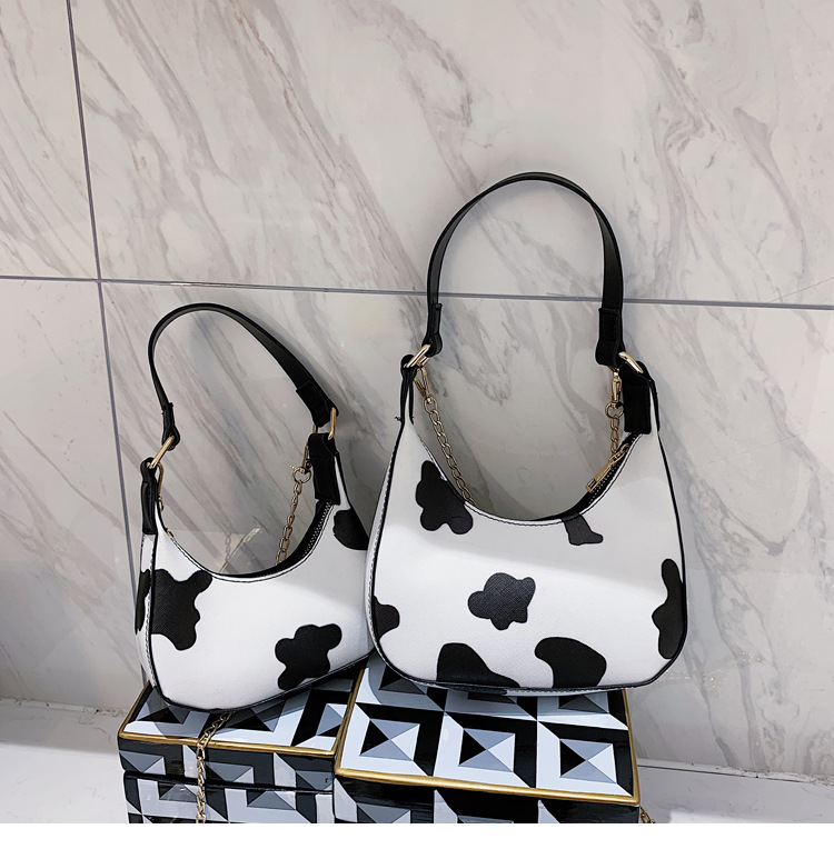 2020 small crowd style milk-print saddle chain vintage moon bag small personality mini one-shoulder armpit bag 
2020 small crowd style milk-print saddle chain vintage moon bag small personality mini one-shoulder armpit bag