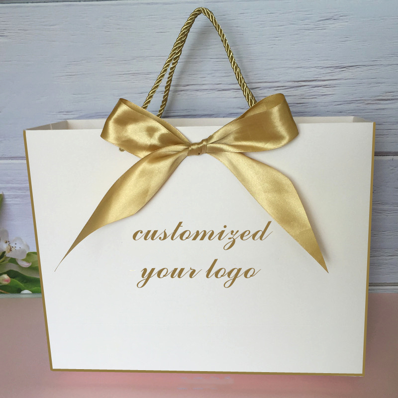 100pcs pink/white Customized logo gift bag Box For Wedding gift pack Clothes wig Packaging Gold Handle with Ribbon
100pcs pink/white Customized logo gift bag Box For Wedding gift pack Clothes wig Packaging Gold Handle with Ribbon