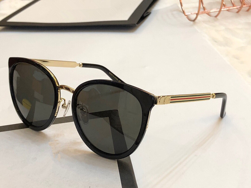 New Fashion Designer Sunglasses 0077 metal frame womens popular cat eye glasses top quality charming style UV400 brand eyewear with Package 
New Fashion Designer Sunglasses 0077 metal frame womens popular cat eye glasses top quality charming style UV400 brand eyewear with Package