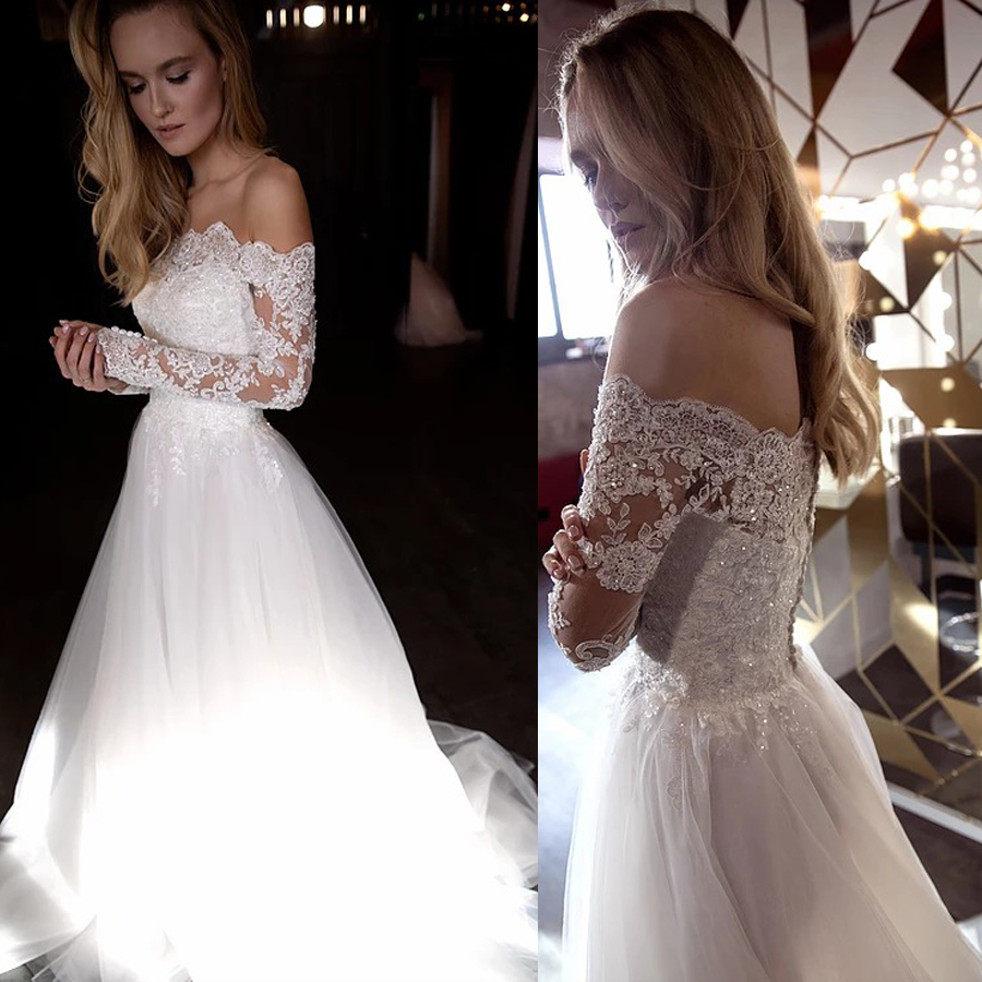 Off the Shoulder Long Sleeves Crystals Applique Wedding Dress A-line vestidos de novia sencillos with Button Bridal Dress, Ivory 
Off the Shoulder Long Sleeves Crystals Applique Wedding Dress A-line vestidos de novia sencillos with Button Bridal Dress, Ivory