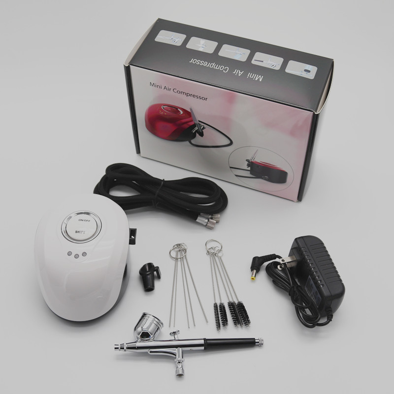 Dual Action Airbrush Kit 7cc Compressor With Air Brush mini spray gun Paint Spray Gun For Nail Art Make Up Air-brush Beauty pen
Dual Action Airbrush Kit 7cc Compressor With Air Brush mini spray gun Paint Spray Gun For Nail Art Make Up Air-brush Beauty pen
