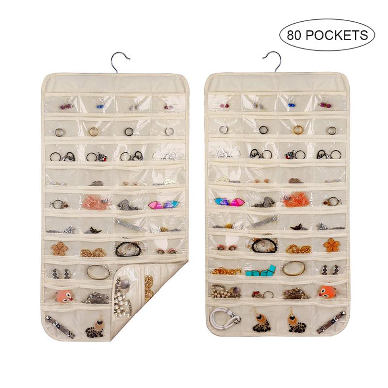 New 80 Pocket Hanging Loop Storage Bag Jewelry Holder Necklace Bracelet Earring Ring Organizer Jewelry Display Bag Organiser
New 80 Pocket Hanging Loop Storage Bag Jewelry Holder Necklace Bracelet Earring Ring Organizer Jewelry Display Bag Organiser