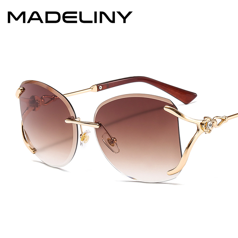 Sunglasses MADELINY Fashion Rimless Square Women 2021 Diamond Decoration Alloy Frame Sun Glasses Ocean Lenses Eyewear MA381
Sunglasses MADELINY Fashion Rimless Square Women 2021 Diamond Decoration Alloy Frame Sun Glasses Ocean Lenses Eyewear MA381