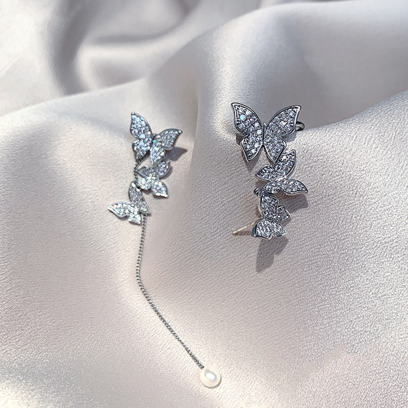 New super flashing delicate butterfly imitation pearl girl earrings temperament net red earrings women jewelry
New super flashing delicate butterfly imitation pearl girl earrings temperament net red earrings women jewelry