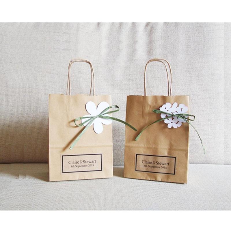 Personalised gift bags bridesmaid gifts wedding favour bags with white flowers in various size mother of the bride/Groom
Personalised gift bags bridesmaid gifts wedding favour bags with white flowers in various size mother of the bride/Groom