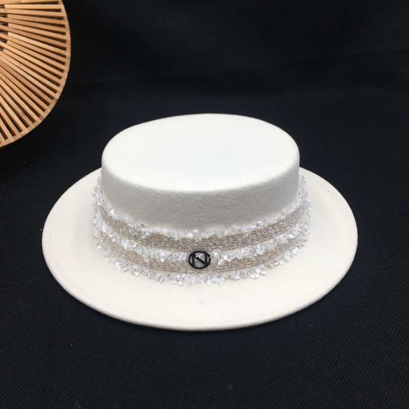 Fedora new wool hat thin metal ring cap white wide brim sun hat fashion female panama, As pic
Fedora new wool hat thin metal ring cap white wide brim sun hat fashion female panama, As pic