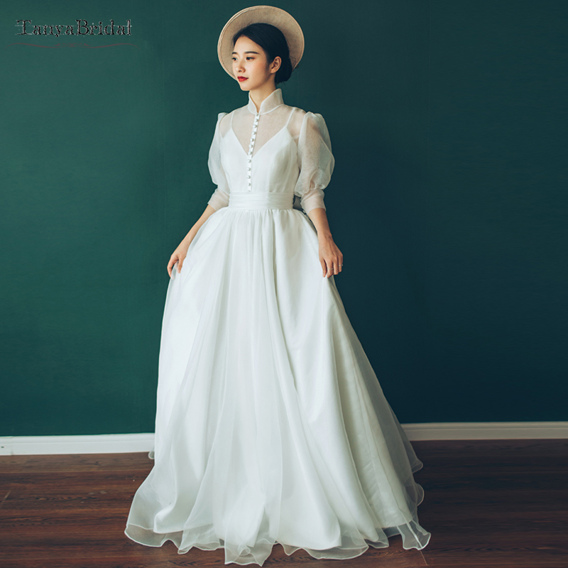 Tea Length Hepburn Style Wedding Dresses Vintage Button High Neck Bridal Gowns Fashion Summer Beach Noivas DW070, Teal length ivory
Tea Length Hepburn Style Wedding Dresses Vintage Button High Neck Bridal Gowns Fashion Summer Beach Noivas DW070, Teal length ivory