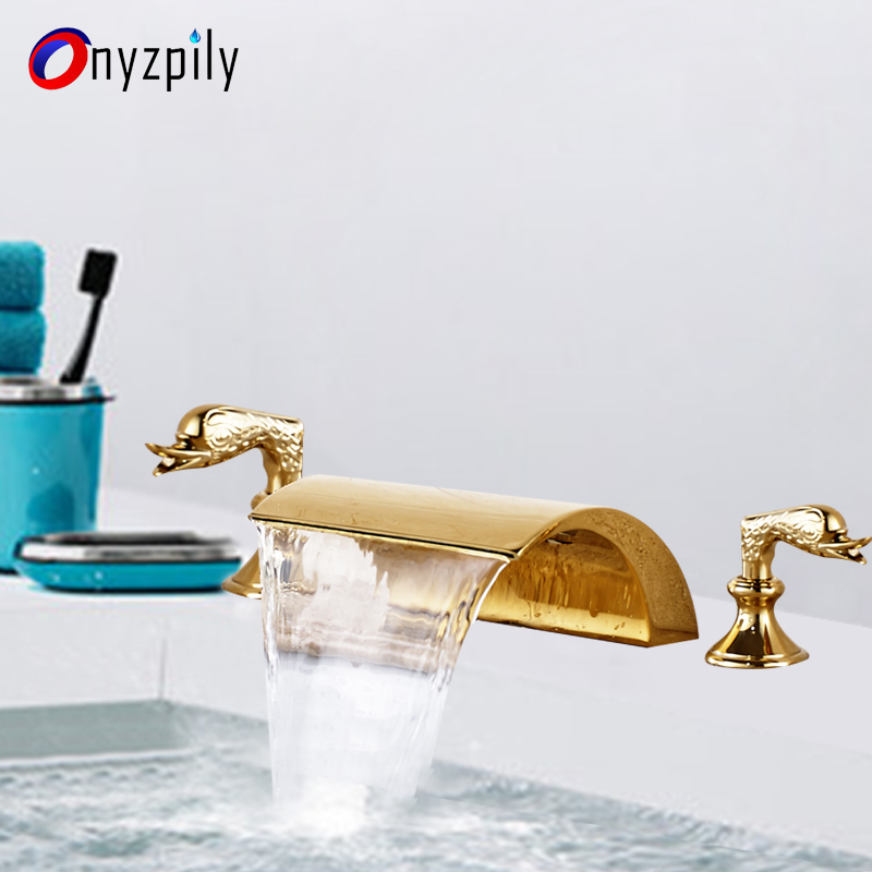 Golden Bathroom Basin Faucet Tap Polished Waterfall Bathtub Swan Two Glass Handles 3 Hole Mixer Elegant tap Widespread torneira
Golden Bathroom Basin Faucet Tap Polished Waterfall Bathtub Swan Two Glass Handles 3 Hole Mixer Elegant tap Widespread torneira