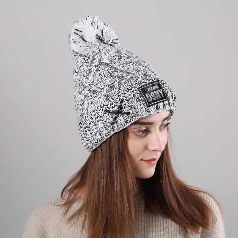 New winter curling plus velvet label Agenda DgNY men's and women's knitted warm outdoor hat with rope, Black
New winter curling plus velvet label Agenda DgNY men's and women's knitted warm outdoor hat with rope, Black