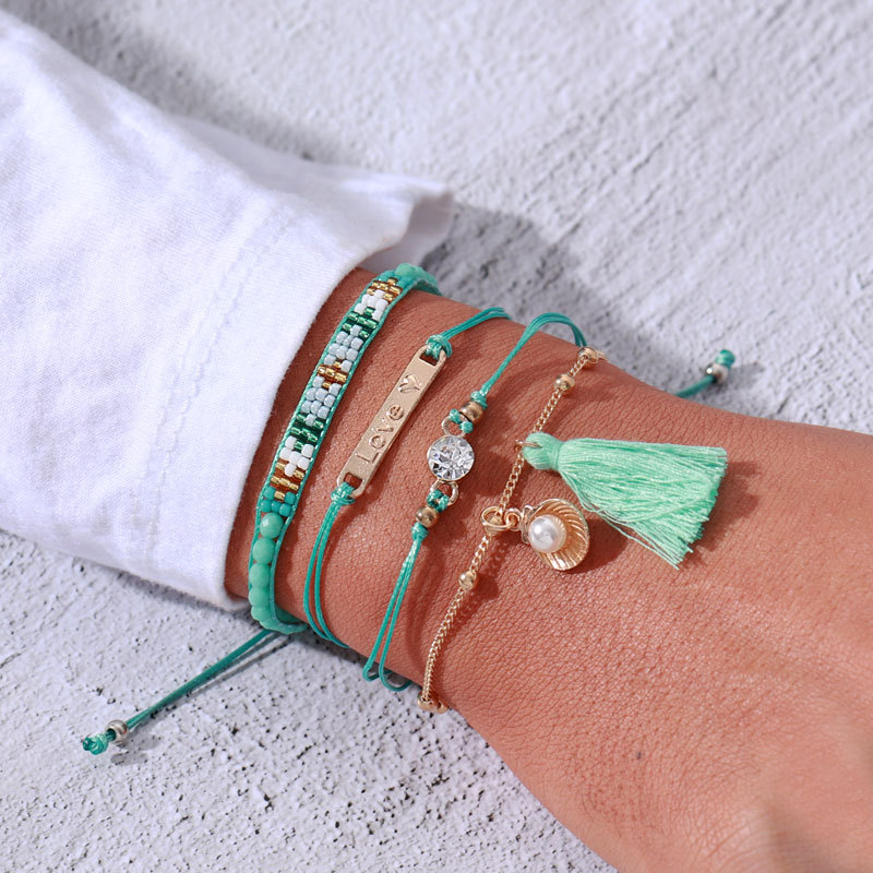 European & American Simple Fashion Multi-piece Candy Color Tassel Wrap Bracelet Bohemia Handmade Rope Chain Link Bracelet Set
European & American Simple Fashion Multi-piece Candy Color Tassel Wrap Bracelet Bohemia Handmade Rope Chain Link Bracelet Set